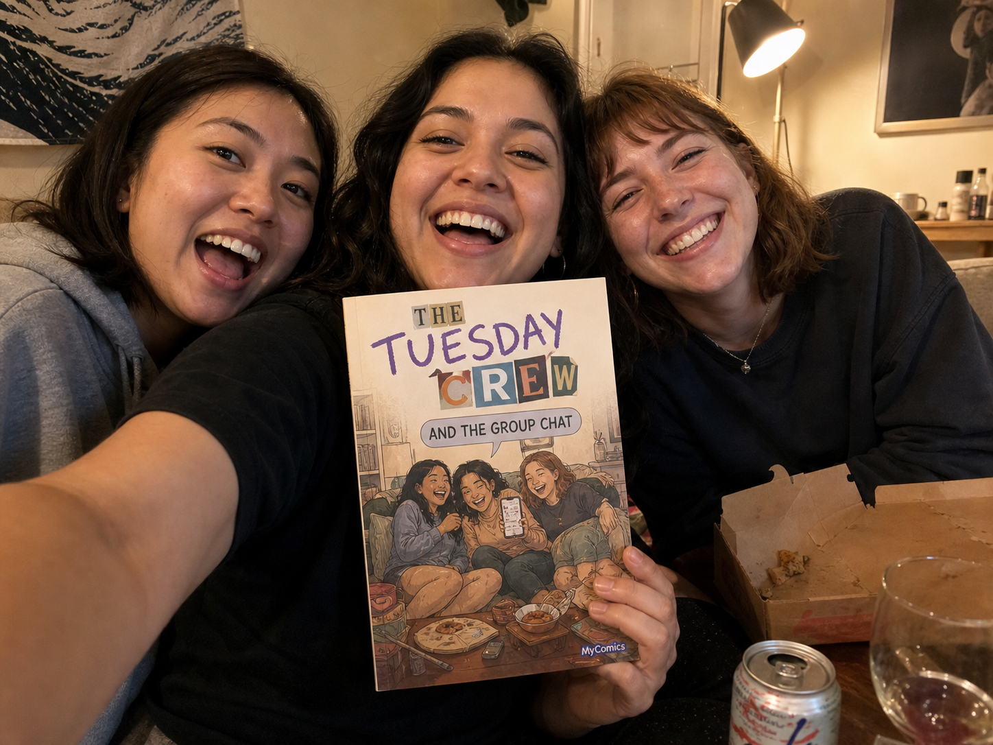 Priya K. holding their printed comic